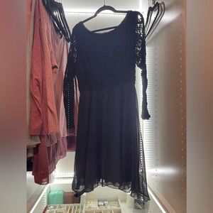 Black short dress with long sleeve mesh floral details